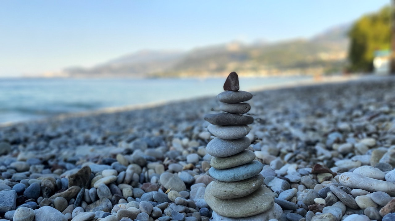 Zen photo of a stone totem in akrata beach